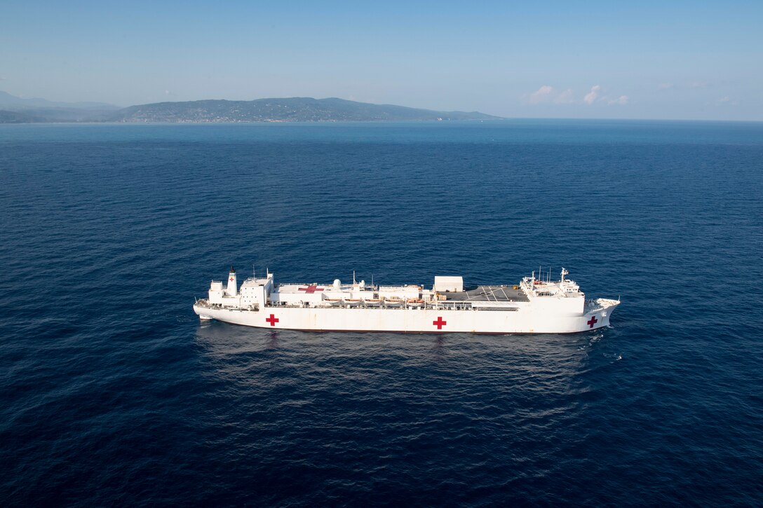 The hospital ship USNS Comfort (T-AH 20) sails off the coast of Jeremie, Haiti in support of Continuing Promise, Dec. 14, 2022.
