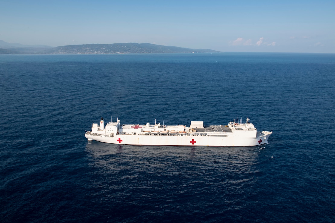 The hospital ship USNS Comfort (T-AH 20) sails off the coast of Jeremie, Haiti in support of Continuing Promise, Dec. 14, 2022.