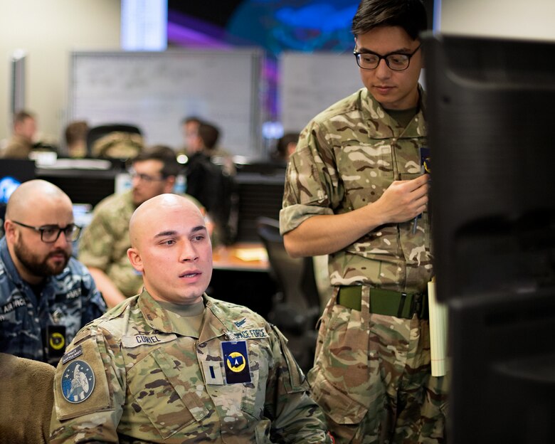 U.S. Space Force 1st Lt. Joseph Curiel, 10th Space Warning Squadron, middle, leverages his ground-based radar expertise to weaponeer Coalition forces for Space Domain Awareness during SPACE FLAG 23-1