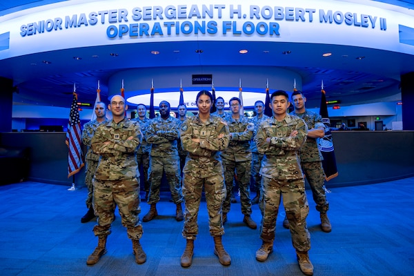 Military members pose for a group photo