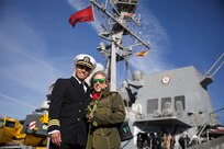 Cmdr. Corry Lougee, executive officer of the Arleigh Burke-class guided-missile destroyer USS Paul Ignatius (DDG 117), greets his family on the pier onboard Naval Station Rota, Spain, as Paul Ignatius returns home from its first Forward Deployed Naval Forces-Europe (FDNF-E) patrol, Dec. 20, 2022.
