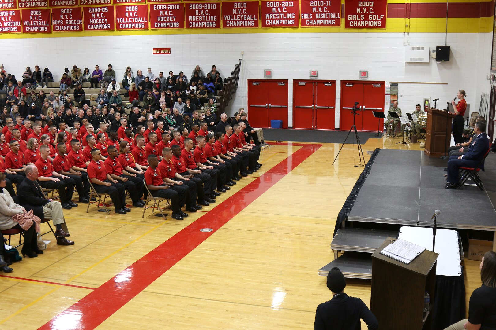 Cadet Ellie McDonald, distinguished honor graduate, addresses her graduating class during the Wisconsin National Guard Challenge Academy Graduation 17 at Sparta High School, Sparta, Wis. After graduating from the 22-week residential phase of academy training, cadets work with hometown mentors who offer guidance and encouragement in pursuing their new direction in life. The National Guard Youth Challenge Program currently operates 40 programs in 29 states, Puerto Rico and the District of Columbia. Nationwide, more than 190,000 teens have graduated from this free program since its inception in 1993. Wisconsin National Guard photo by Staff Sgt. Alice Ripberger