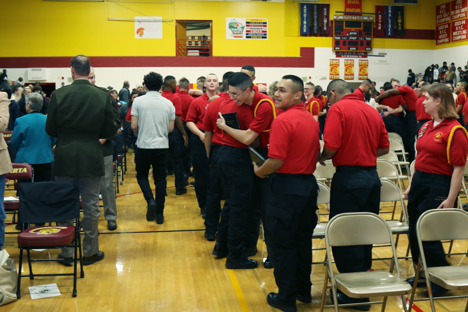 Challenge Academy cadets celebrate at the Wisconsin National Guard Challenge Academy graduation ceremony Saturday, Dec. 17 at Sparta High School, Sparta, Wis. After graduating from the 22-week residential phase of academy training, cadets work with hometown mentors who offer guidance and encouragement in pursuing their new direction in life. The National Guard Youth Challenge Program currently operates 40 programs in 29 states, Puerto Rico and the District of Columbia. Nationwide, more than 190,000 teens have graduated from this free program since its inception in 1993. Wisconsin National Guard photo by Staff Sgt. Alice Ripberger