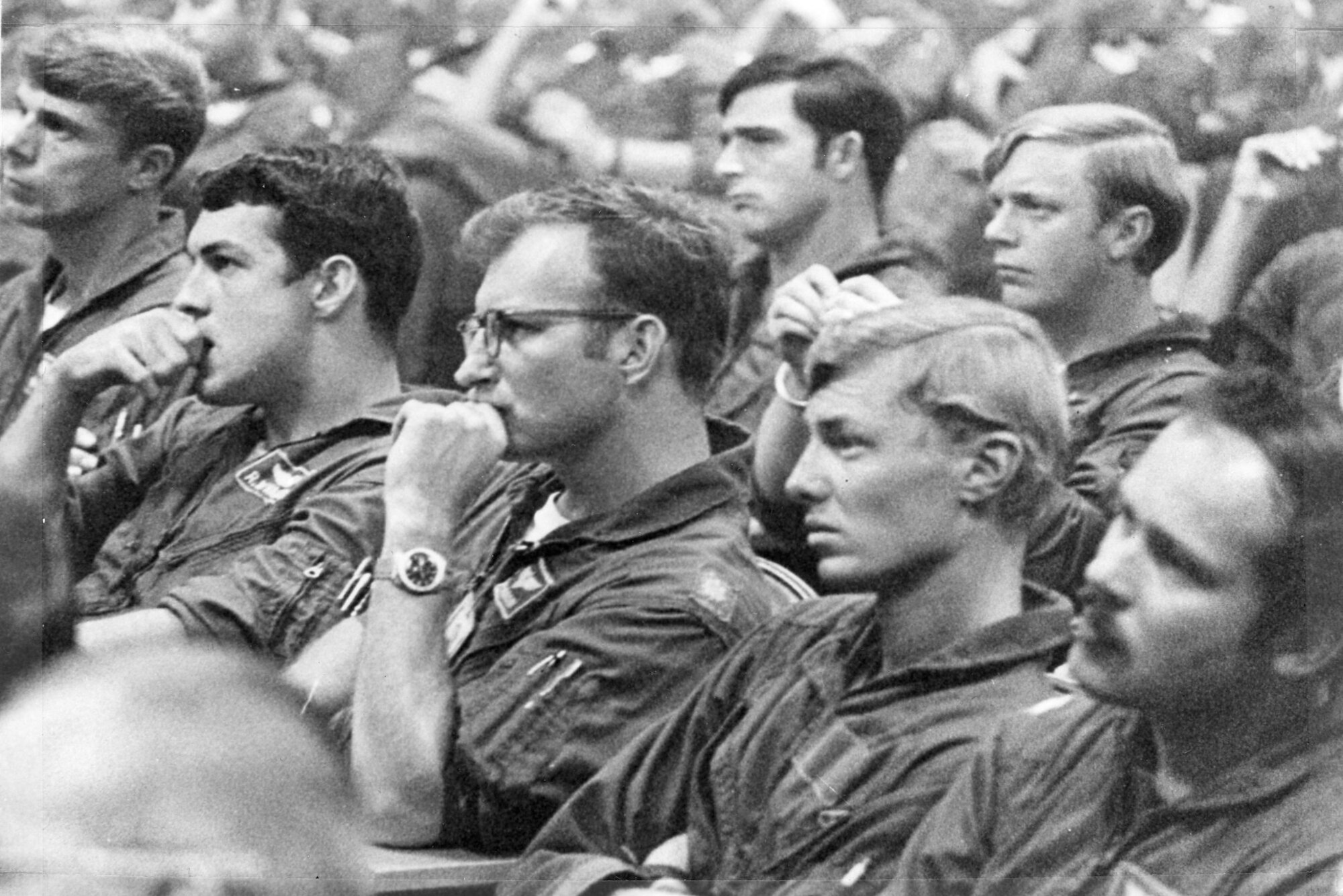 A historical image of aircrew members being briefed on Operation Linebacker II