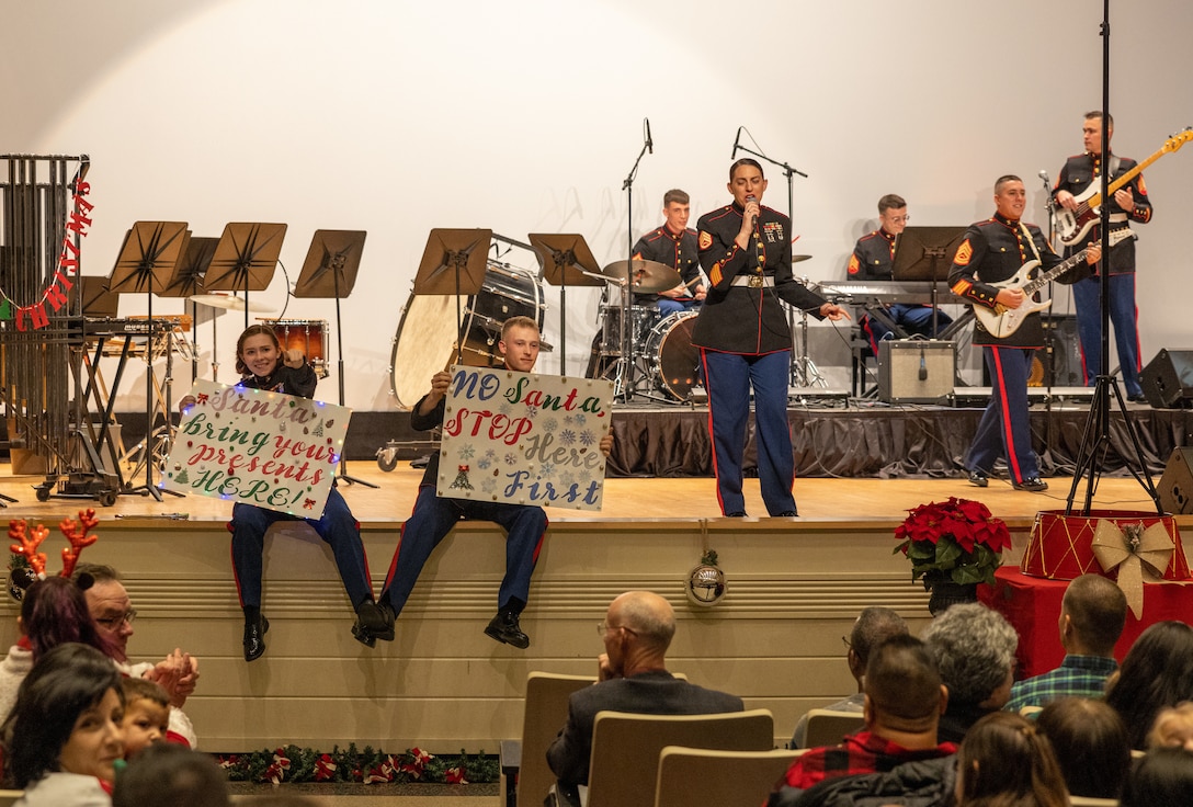 U.S. Marines with the Quantico Marine Corps Band participate in the annual Holiday Concert at Little Hall on Marine Corps Base Quantico, Virginia, Dec. 11, 2022. The band’s mission is to provide musical support that will encourage community relations, enhance troop morale, and promote the Marine Corps recruiting program through its demanding performance schedule. (U.S. Marine Corps Photo by Lance Cpl. Kayla LeClaire)