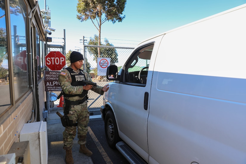 558th Military Police Company, 728th Military Police Battalion, 8th Military Police Brigade Soldier, Spc. Elian Vazquez conducts gate security duties during a law enforcement operation on Pohakuloa Training Area, Hawaii, Dec. 9, 2022. The “Warfighters” Battalion Soldiers were tasked to assist Department of the Army (DA) Civilian Police officers on PTA, in response to increased road traffic due to a nearby volcanic eruption.