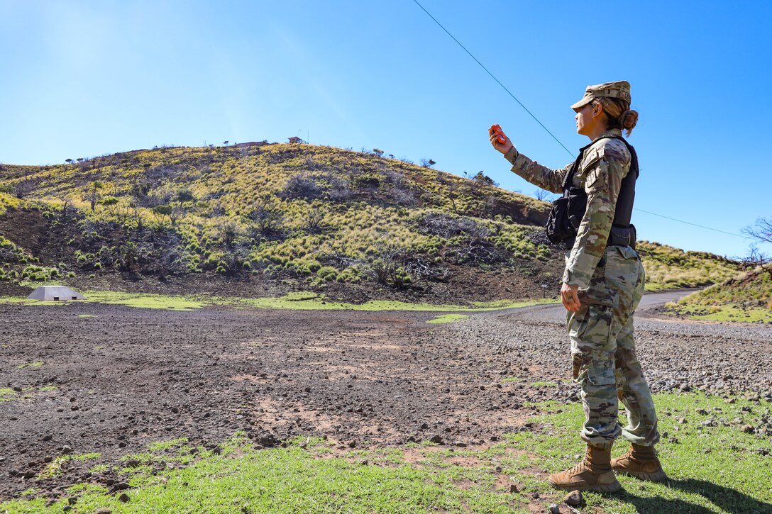 558th Military Police Company, 728th Military Police Battalion, 8th Military Police Brigade Soldier, Staff Sgt. Jaelene Leavitt measures air quality during a law enforcement operation on Pohakuloa Training Area, Hawaii, Dec. 10, 2022. The “Warfighters” Battalion Soldiers were tasked to assist Department of the Army (DA) Civilian Police officers on PTA, in response to increased road traffic due to a nearby volcanic eruption.