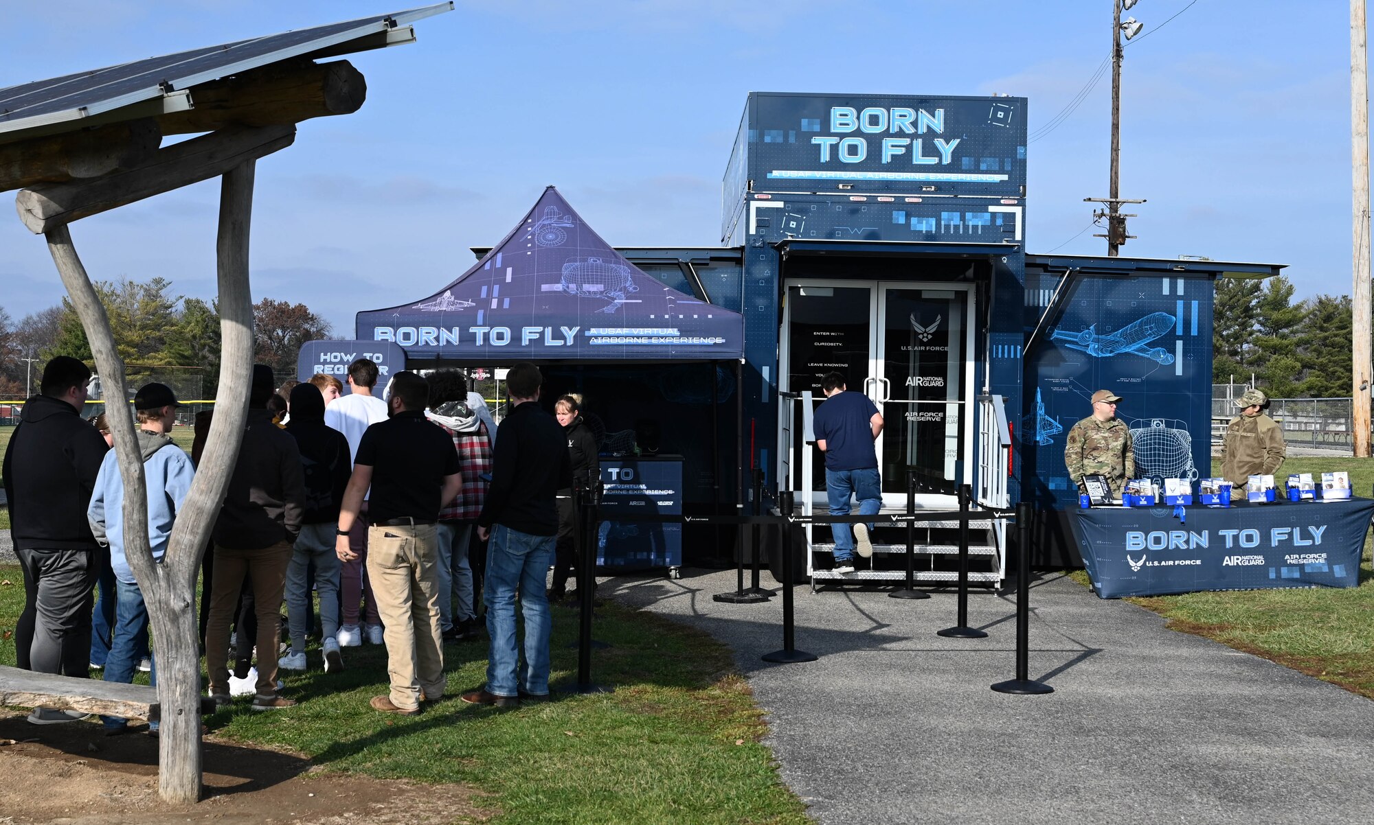 High school students operate an Air Force F-35 computer flight simulation