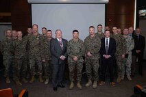 U.S. Marine Corps Brig. Gen. Kyle B. Ellison, the commanding general for Marine Corps Warfighting Laboratory (MCWL), visits Fleet Marine Force, Atlantic (FMFLANT), Marine Forces Command (MARFORCOM), Marine Forces Northern Command (MARFOR NORTHCOM) at Naval Support Activity Hampton Roads, Virginia, Dec. 19, 2022. The meeting was held to better understand the mission, priorities and requirements of each respective command to ensure all are aligned and supported. MCWL generates, examines and provides analytically-supported recommendations to inform subsequent force design development activities. (U.S. Marine Corps photo by Lance Cpl. Jack Chen)