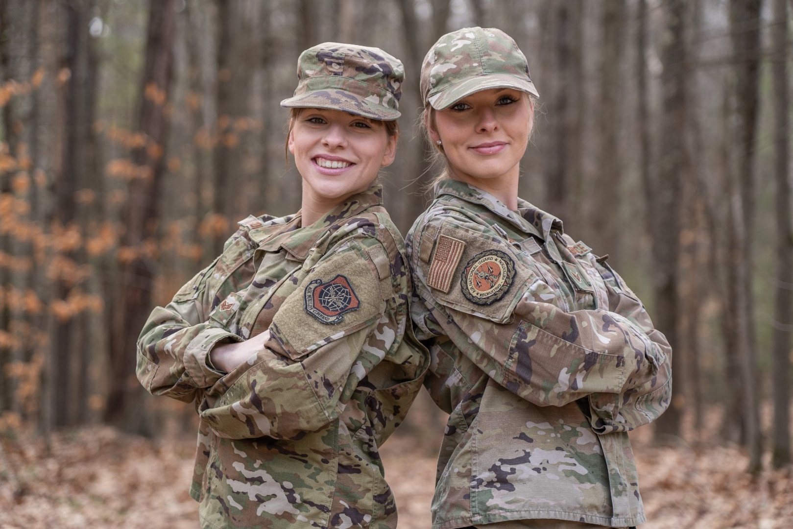 From left, Senior Airmen Gillian and Olivia Conley, fraternal twin sisters, pose in Northfield, New Hampshire, on Dec. 10, 2022. The Conleys first enlisted in the New Hampshire Air National Guard in 2017 and attended basic training and technical school together. Olvia recently transferred to the Connecticut Air National Guard for a full-time recruiting position, while Gillian serves at Pease Air National Guard Base in Newington, New Hampshire, as a respiratory therapist with the 157th Medical Group. They participated in a brief National Twin Day Q&A this year to recognize the holiday.