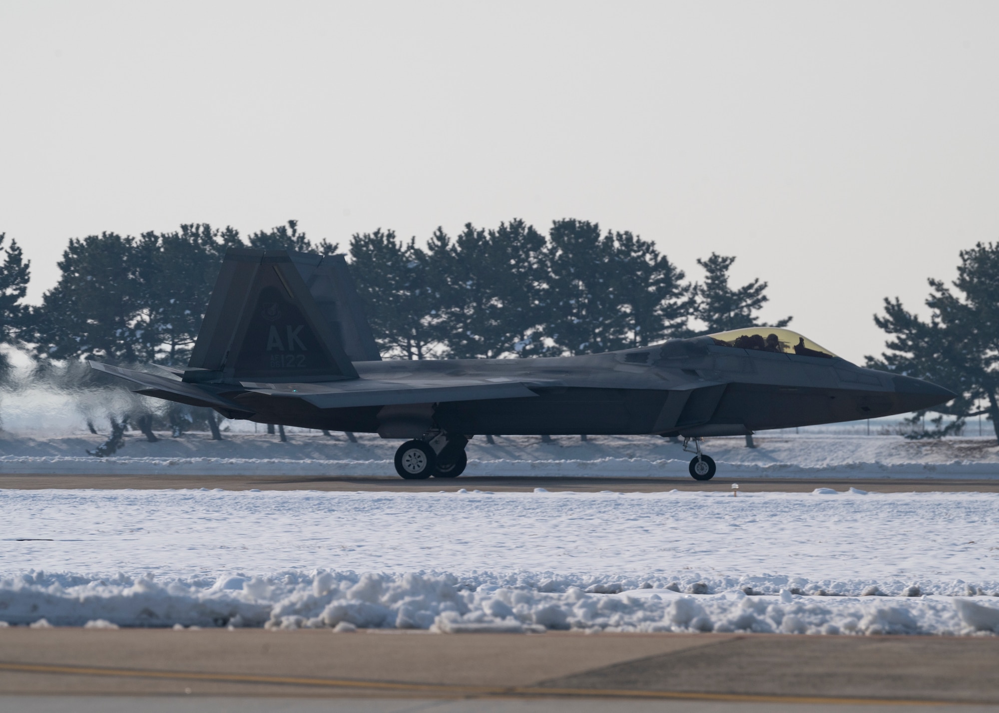 An F-22 assigned to the 525th Fighter Squadron, Joint Base Elmendorf-Richardson, Alaska, touches down at Kunsan Air Base, Republic of Korea, Dec. 20, 2022.