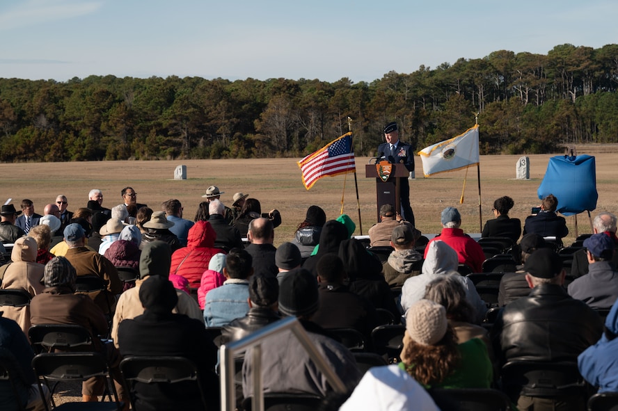 Gen. Mark Kelly, commander of Air Combat Command, delivers the keynote speech during the 119th Wright Bothers Anniversary of Powered Flight ceremony