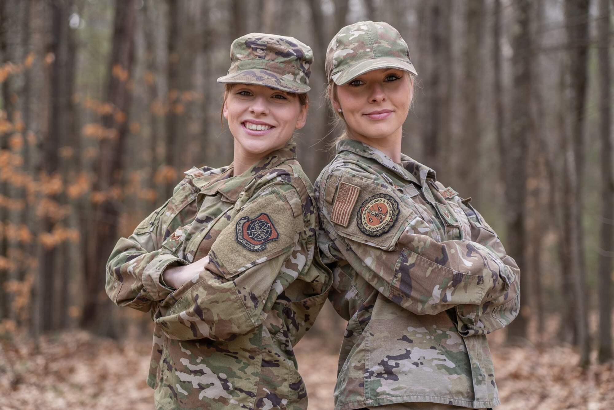 From left, Senior Airmen Gillian and Olivia Conley, fraternal twin sisters, pose in Northfield, New Hampshire, on Dec. 10, 2022. The Conleys first enlisted in the New Hampshire Air National Guard in 2017 and attended basic training and technical school together. Olvia recently transferred to the Connecticut Air National Guard for a full-time recruiting position, while Gillian serves at Pease Air National Guard Base in Newington, New Hampshire, as a respiratory therapist with the 157th Medical Group. They participated in a brief National Twin Day Q&A this year to recognize the holiday.