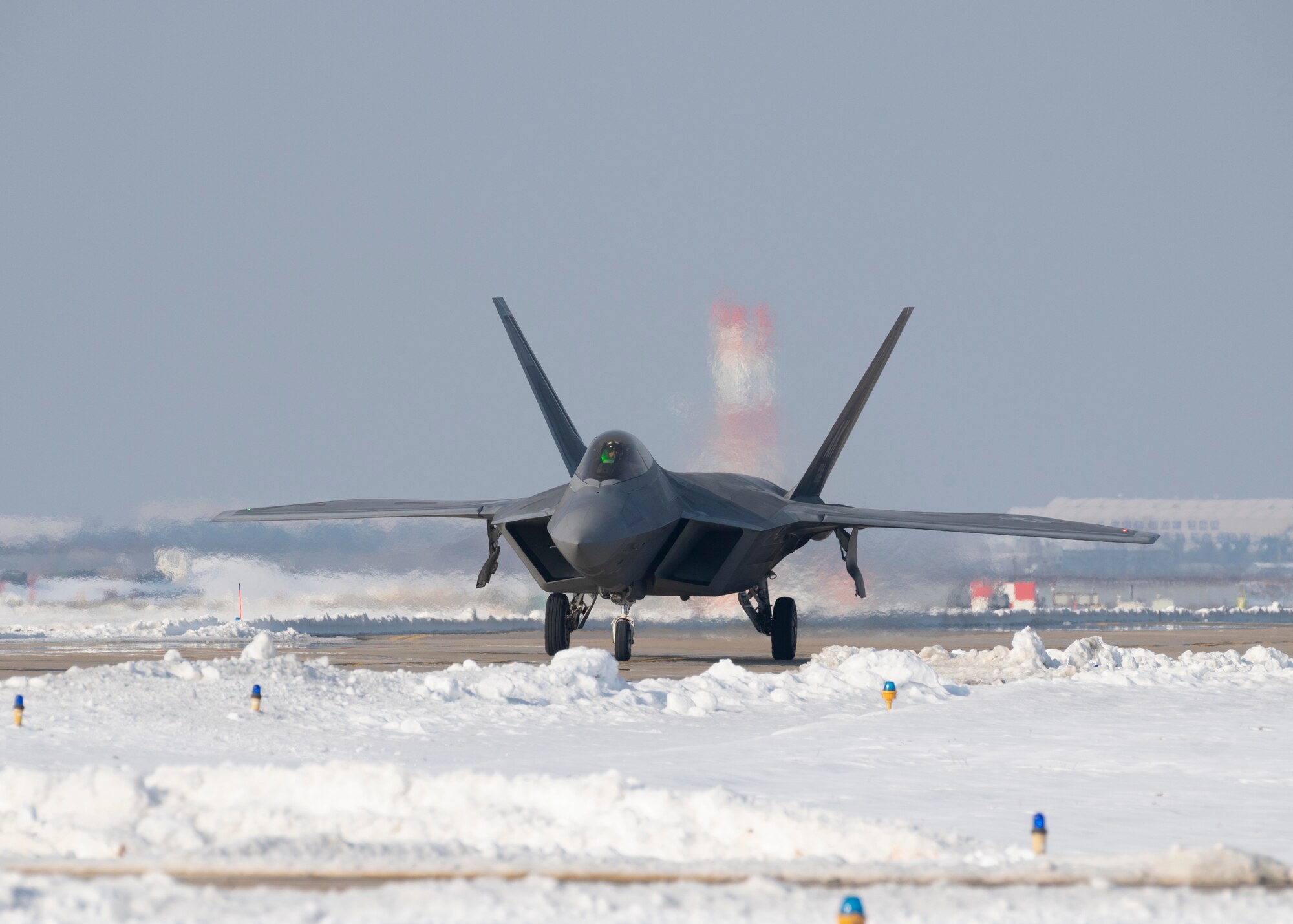 An F-22 Raptor assigned to the 525th Fighter Squadron at Joint Base Elmendorf-Richardson, Alaska, traverses the flightline at Kunsan Air Base, Republic of Korea, Dec. 20, 2022.