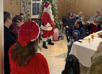 Santa talks to guests at Fisher House