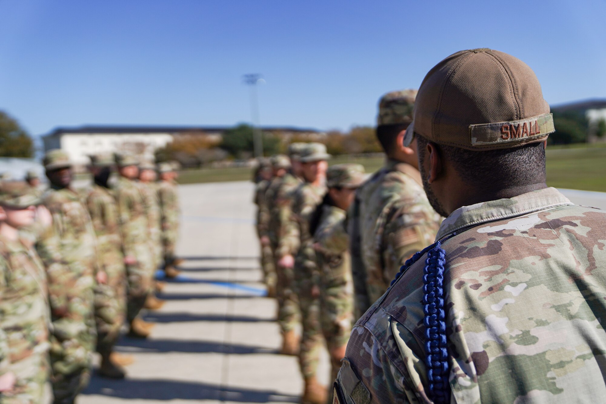 U.S. Air Force Tech Sgt. Kadarryl Small, 336th Training Squadron military training leader, inspects Airmen in training during open ranks at Keesler Air Force Base on Nov. 28, 2022.