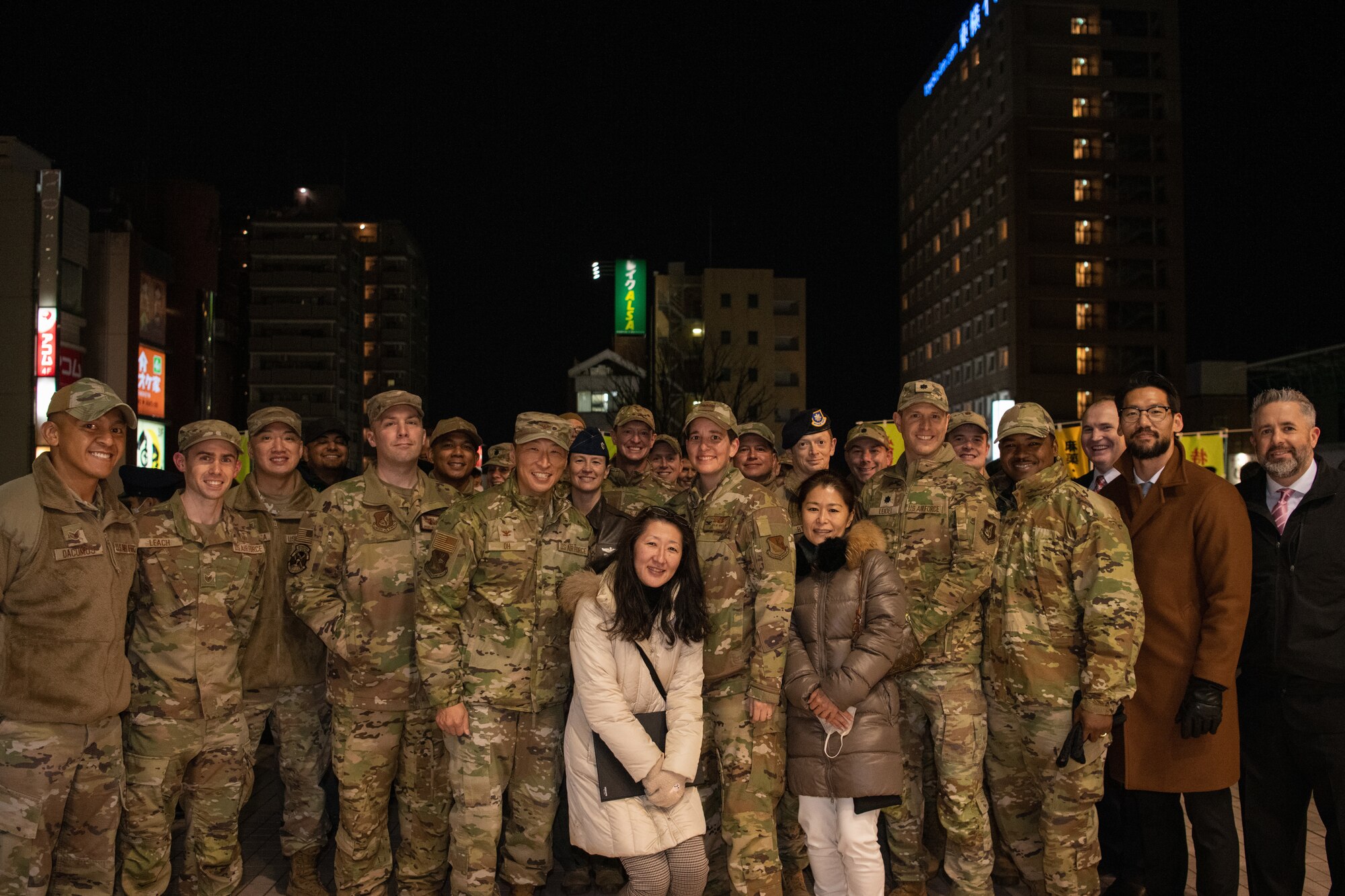 Yokota Air Base leadership and personnel pose for a group photo