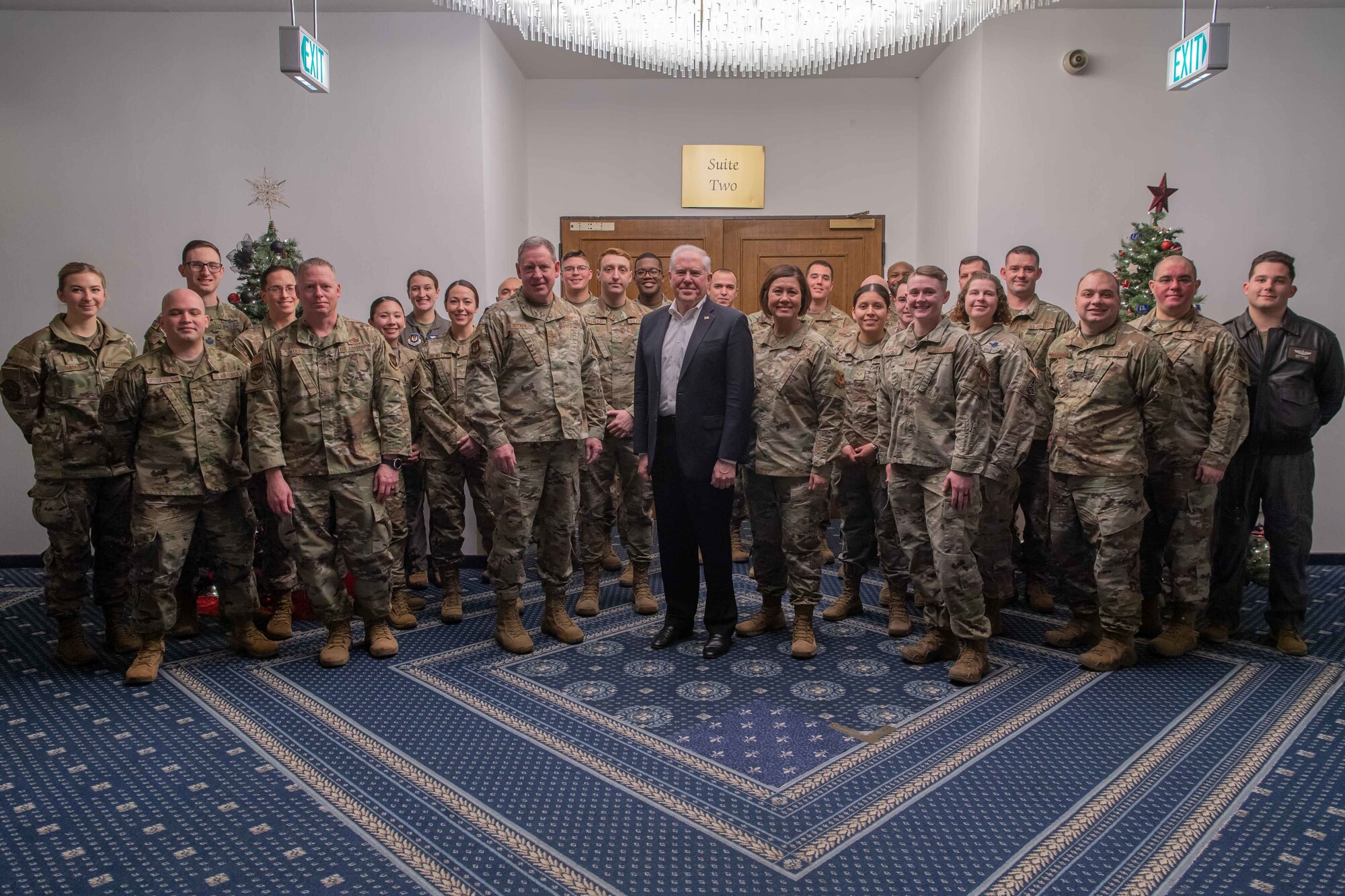 Secretary of the Air Force Frank Kendall poses with Chief Master Sgt. of the Air Force JoAnn S. Bass, Gen. James Hecker, U.S. Air Forces in Europe – Air Forces Africa commander, and Airmen