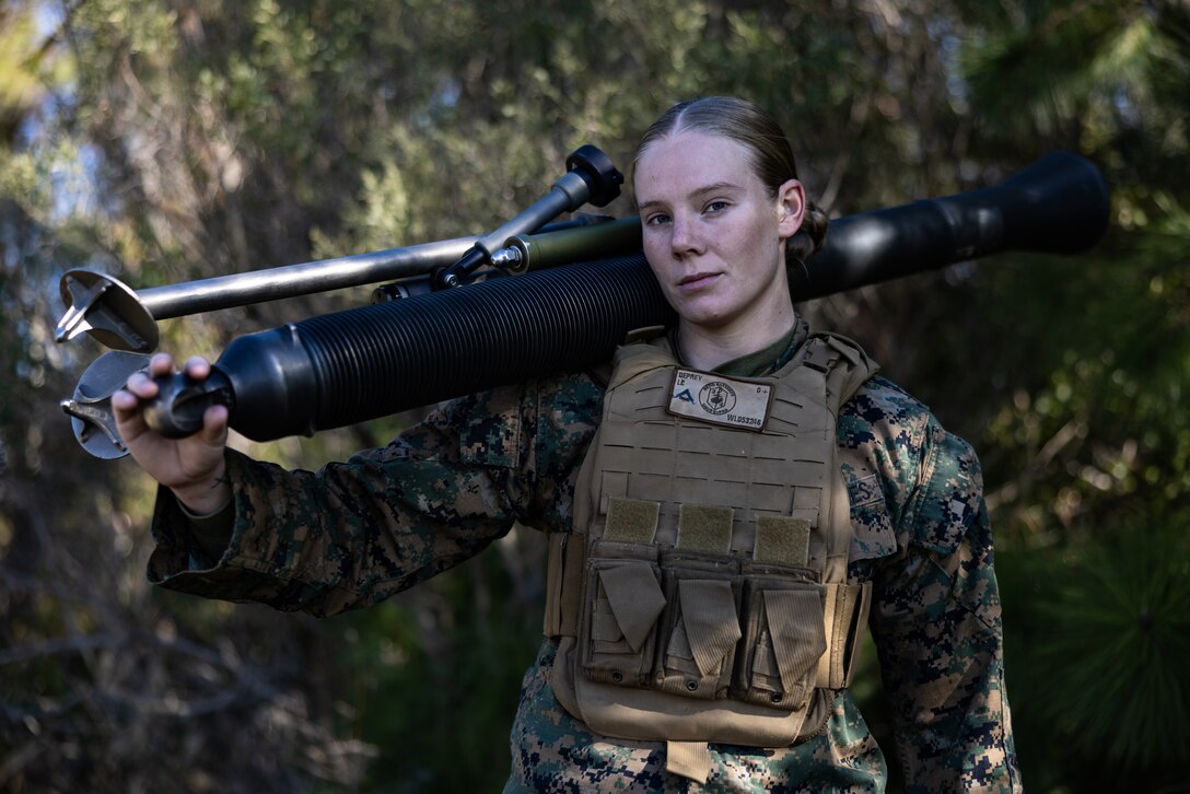 U.S. Marine Corps Lance Cpl. Lydia Deprey, a Waldo, Ohio native and a mortarman with 3rd Battalion, 2d Marine Regiment, 2d Marine Division, poses for a photo on Camp Lejeune, North Carolina, Dec. 19, 2022. In addition to her duties as a mortarman, Deprey is also newly qualified as a Marine Corps Instructor of Water Survival. Deprey was identified as a “Follow Me” Marine in efforts to share the stories of 2d MARDIV Marines. (U.S. Marine Corps photo by Lance Cpl. Malia Sparks)