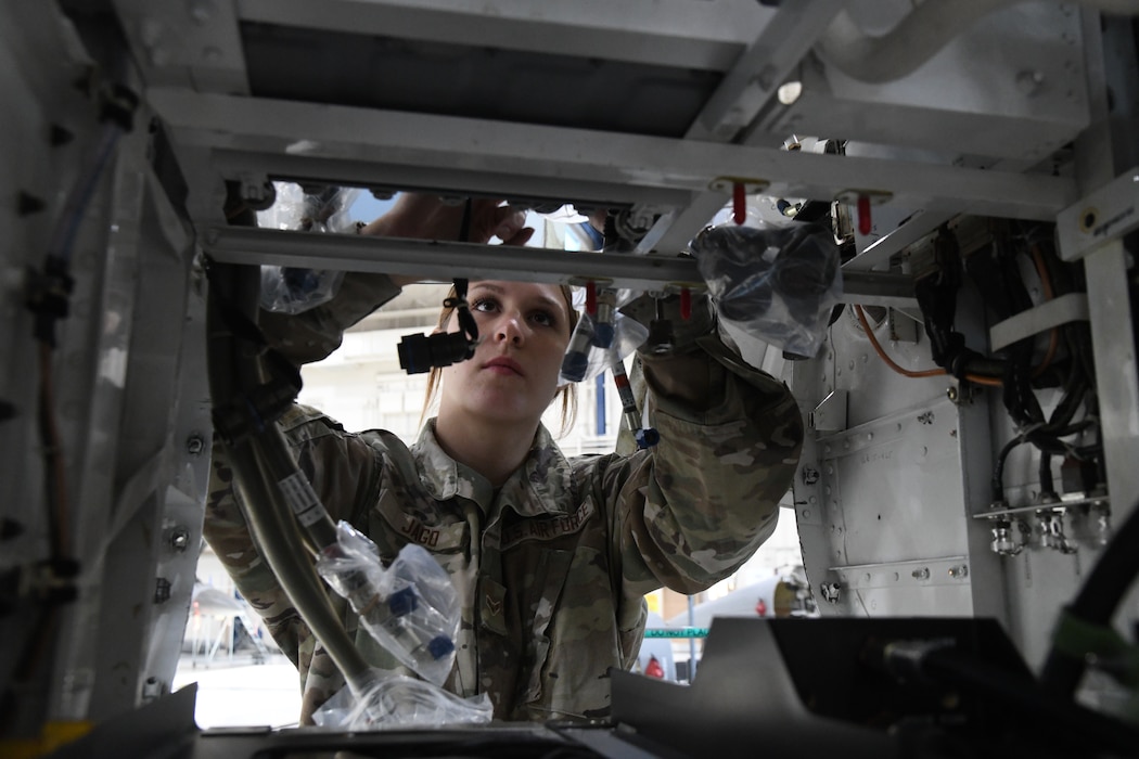 An Aircraft Integrated Avionics specialist assigned to the 148th Fighter Wing, Minnesota Air National Guard installs the active electronic scanned array (AESA) radar on an F-16 Fighting Falcon on November 8, 2022 at the Duluth Air National Guard Base, Minnesota.