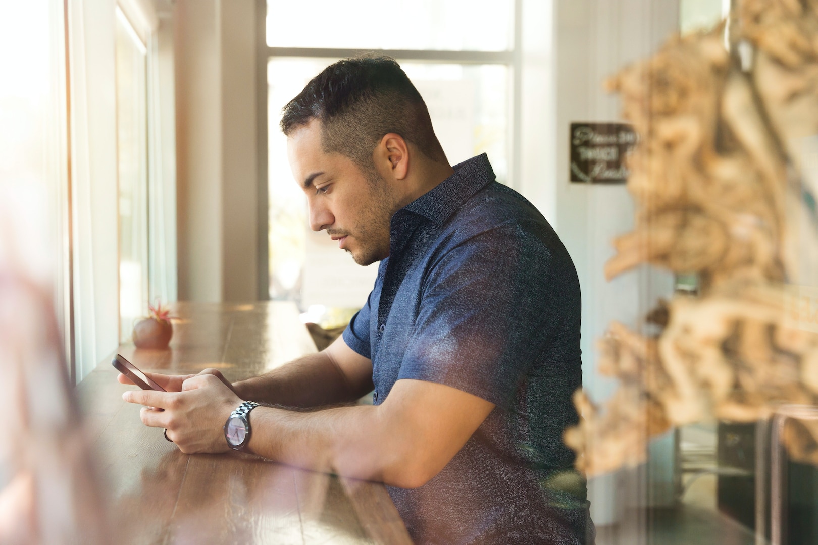 Man looks at phone