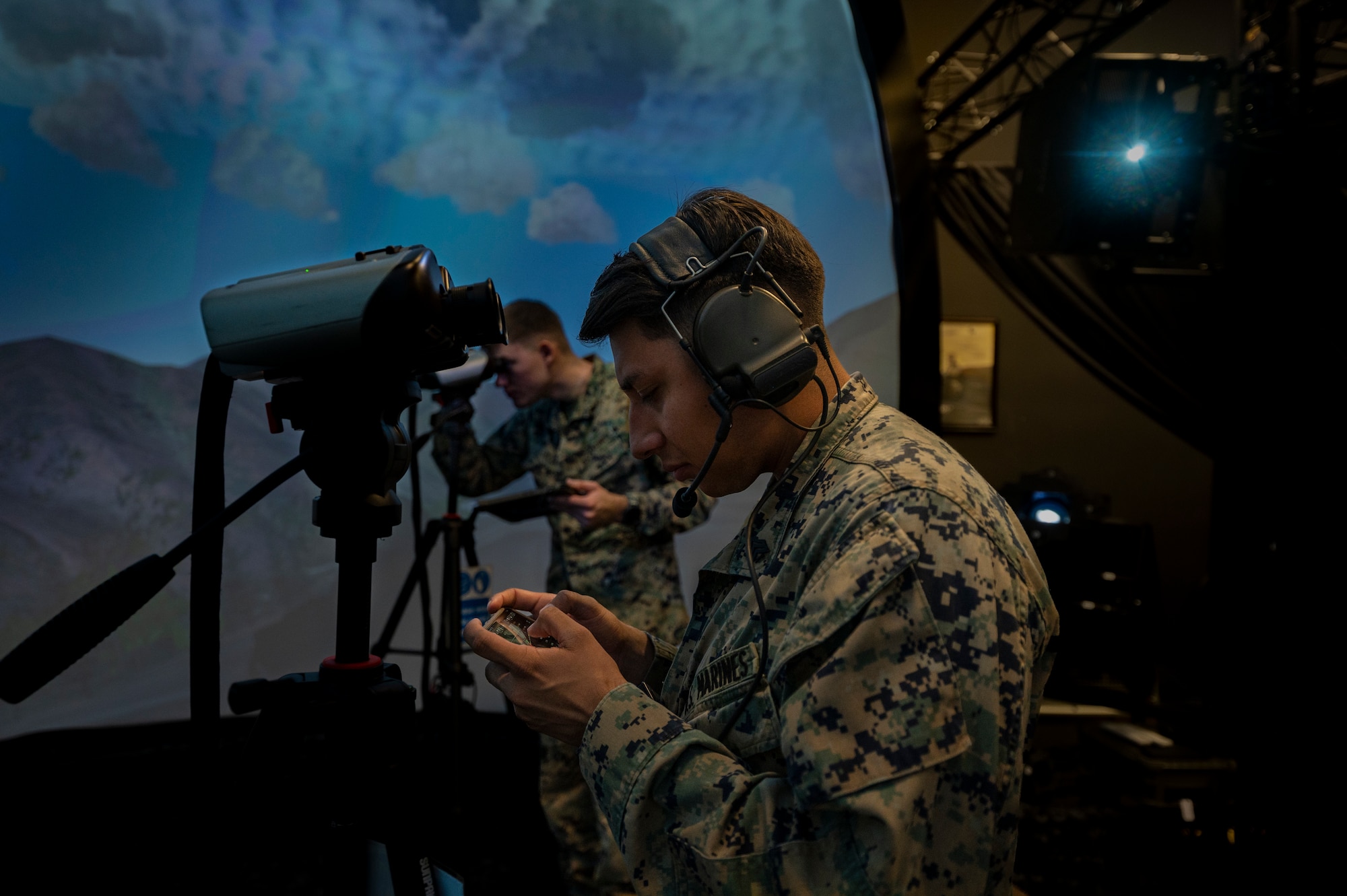 U.S. Marine Sgt. Derek Barrea-Antonio joint terminal attack controller (JTAC) and Cpl. Alexandra Juncan transmission systems operator, 3rd Battalion, 4th Marine Regiment from Twentynine Palms Marine Corps Base, California, participate in a joint training at Osan Air Base, Republic of Korea, Dec. 15, 2022.