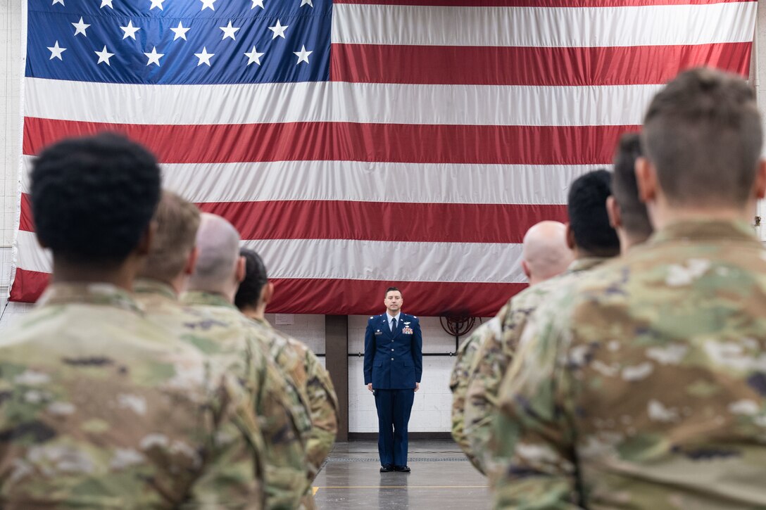 Lt. Col. Daniel Mount, the incoming 28th Maintenance Squadron commander, prepares to render his first salute to the 28th MXS during a change of command ceremony at Ellsworth Air Force Base, South Dakota, Dec. 19, 2022. The change of command ceremony is an honored tradition celebrated time after time when a new commander is chosen to command a squadron or wing. (U.S. Air Force photo by Staff Sgt. Hannah Malone)