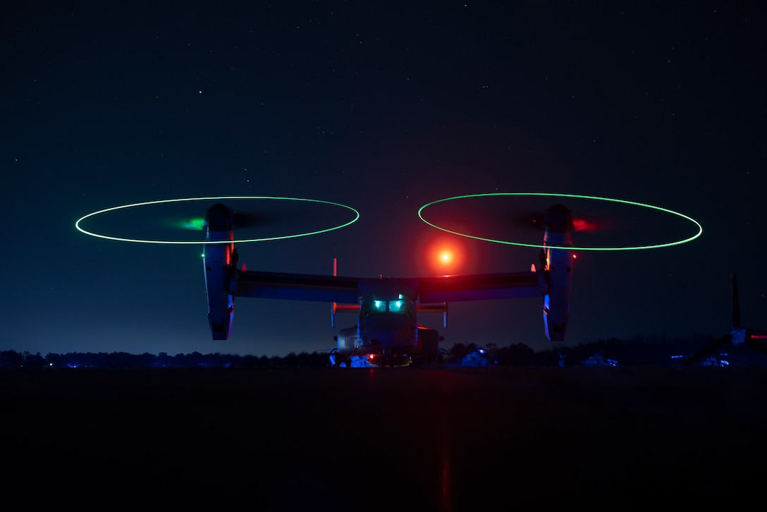 A U.S. Marine Corps MV-22 Osprey with Marine Medium Tiltrotor Squadron 162 Reinforced, 26th Marine Expeditionary Unit, prepares for takeoff during full mission rehearsal in preparation for a simulated raid during Marine Expeditionary Unit Exercise I at Marine Corps Auxiliary Landing Field Bogue, North Carolina, Dec. 19, 2022.  The purpose of the rehearsal was to validate communication nodes from the air and ground in preparation for a simulated raid with Battalion Landing Team 1/6.