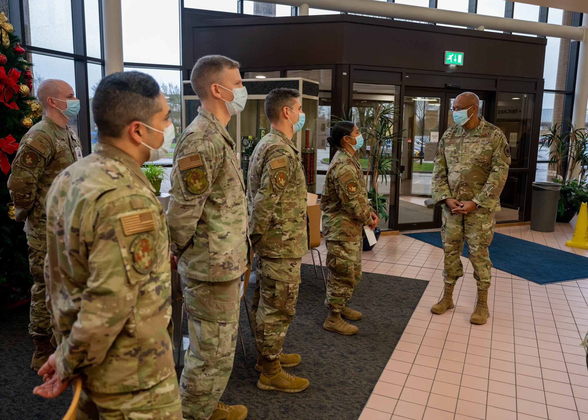 A group of Airmen speak to the Air Force Chief of Staff