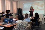 Leidos team member facilitating training
