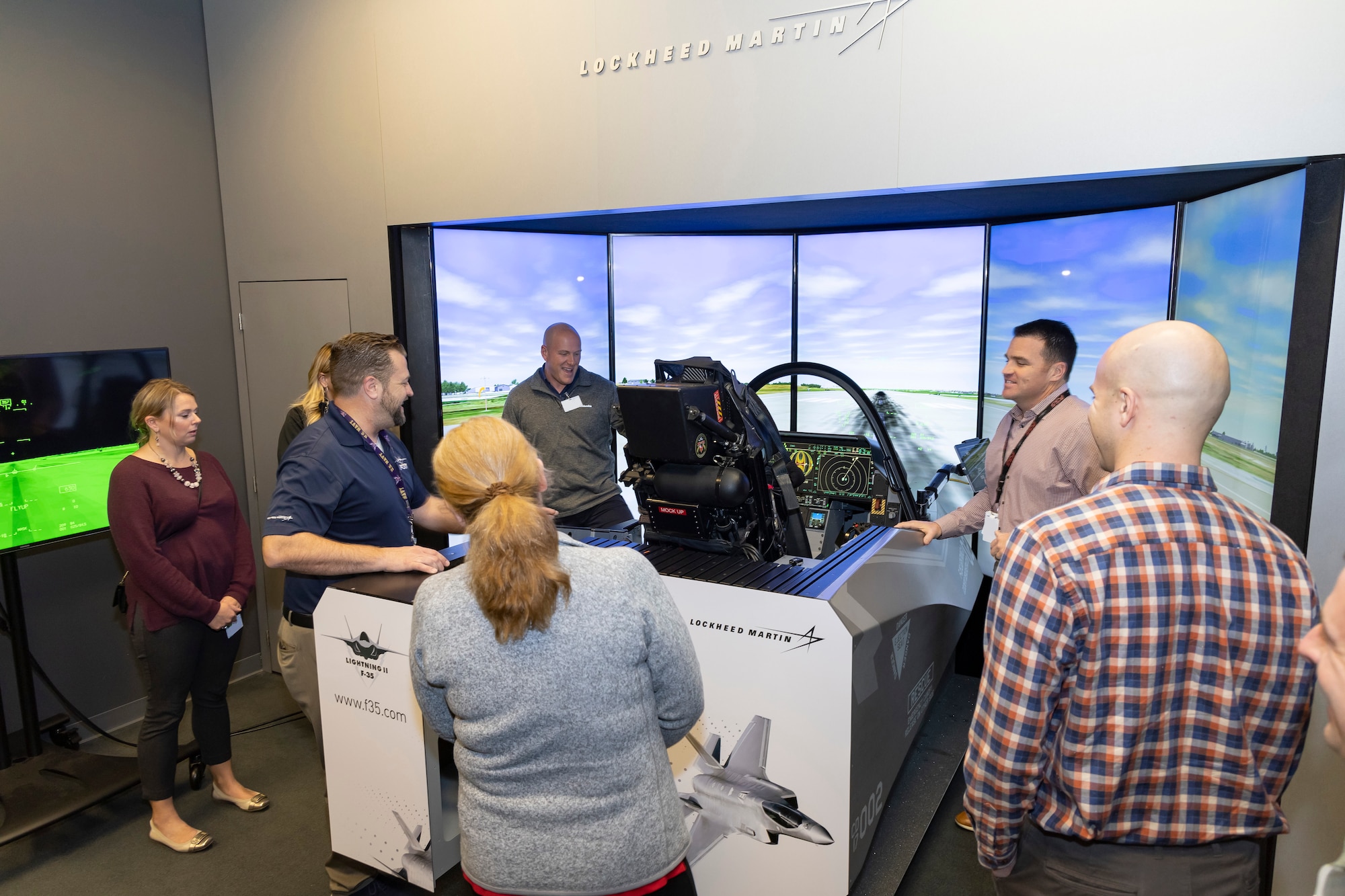 Members learn about the capabilities of an F-35 Aircraft during a visit at Lockheed Martin
