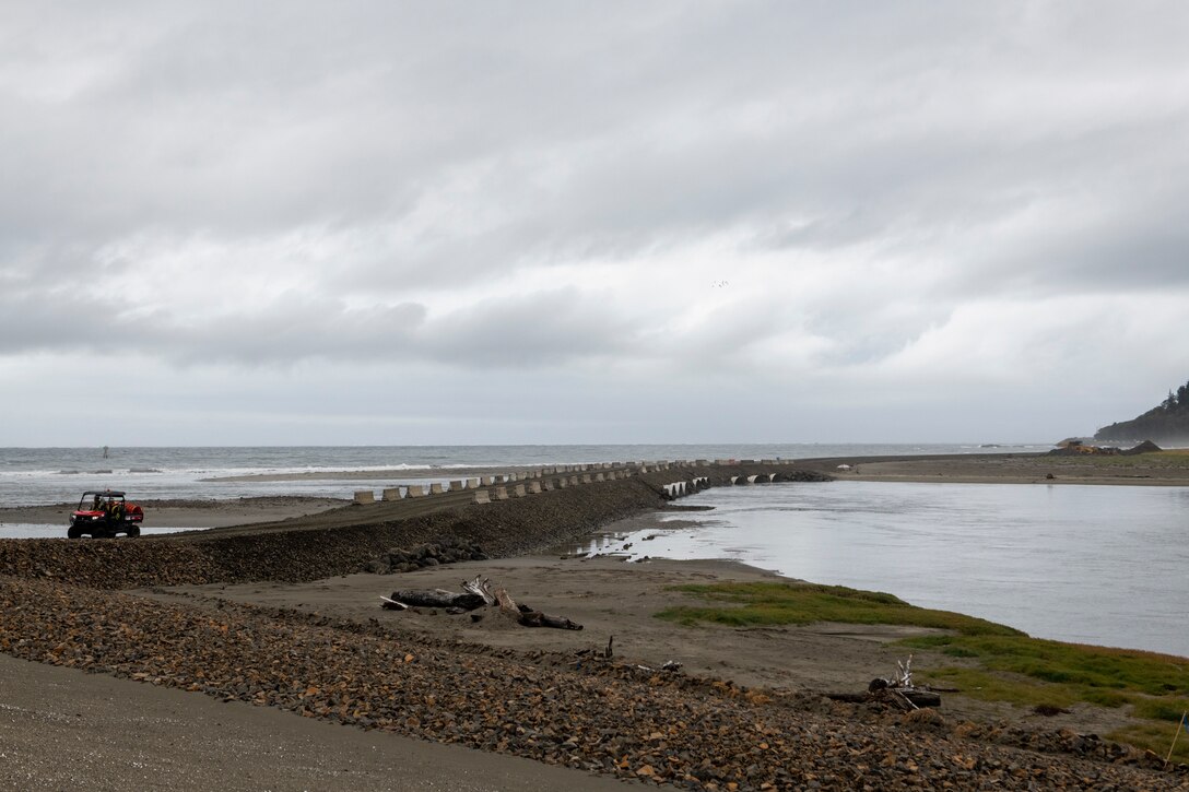 Photo of a buggy crossing the culvert crossing on Shoalwater Bay Dune on the Tokeland Peninsula, Washington.