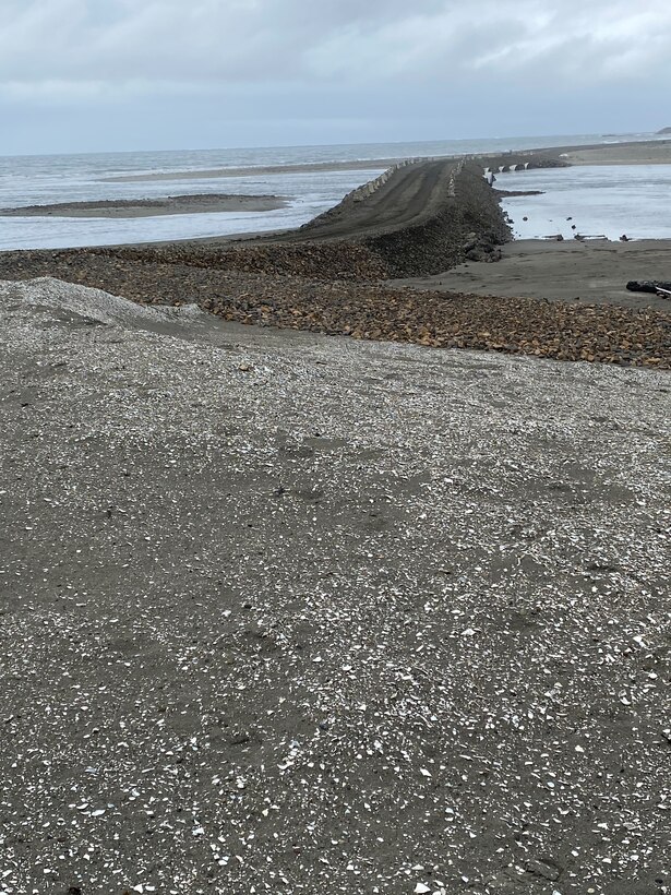 Photo of culvert crossing made of degraded dune, cobble/boulder sized rock, built to complete repairs to the Shaolwater Bay Dune, on the Tokeland Peninsula, Washington, Sept. 29, 2022.