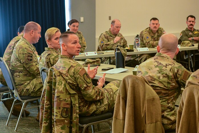The members of the California Installation Commanders Caucus (CICC) gather for a round table discussion at the Community Activity Center on Beale Air Force Base, Calif. on Dec. 7, 2022.