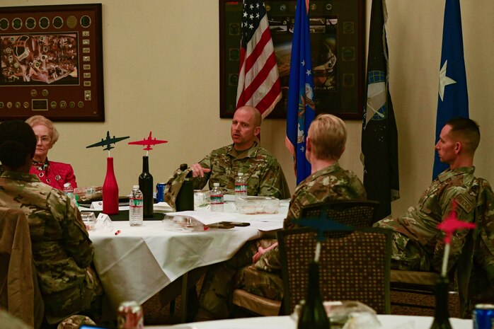 The members of the California Installation Commanders Caucus (CICC) discuss the meeting of the CICC and the Recce Point Club on Beale Air Force Base, Calif. on Dec. 7, 2022.
