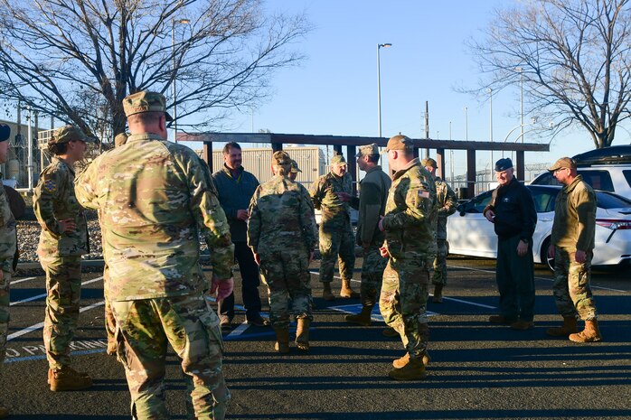 The members of the California Installation Commanders Caucus (CICC) gather outside of the radar of the 7th Space Warning Squadron on Beale Air Force Base, Calif. on Dec. 7, 2022