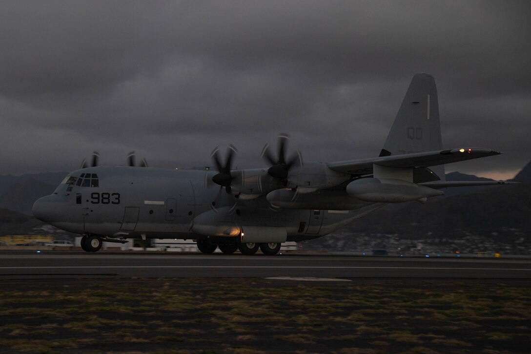 MARINE CORPS AIR STATION KANEOHE BAY, Hawaii (July 20, 2022) A U.S. Air Force C-130 Hercules lands on a flight line during Rim of the Pacific (RIMPAC) 2022, at Marine Corps Air Station Kaneohe Bay, Hawaii, July 20. Twenty-six nations, 38 ships, three submarines, more than 170 aircraft and 25,000 personnel are participating in RIMPAC from June 29 to Aug. 4 in and around the Hawaiian Islands and Southern California. The world's largest international maritime exercise, RIMPAC provides a unique training opportunity while fostering and sustaining cooperative relationships among participants critical to ensuring the safety of sea lanes and security on the world's oceans. RIMPAC 2022 is the 28th exercise in the series that began in 1971. (U.S. Marine Corps photo by Lance Cpl. Tyler Andrews)