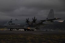MARINE CORPS AIR STATION KANEOHE BAY, Hawaii (July 20, 2022) A U.S. Air Force C-130 Hercules lands on a flight line during Rim of the Pacific (RIMPAC) 2022, at Marine Corps Air Station Kaneohe Bay, Hawaii, July 20. Twenty-six nations, 38 ships, three submarines, more than 170 aircraft and 25,000 personnel are participating in RIMPAC from June 29 to Aug. 4 in and around the Hawaiian Islands and Southern California. The world's largest international maritime exercise, RIMPAC provides a unique training opportunity while fostering and sustaining cooperative relationships among participants critical to ensuring the safety of sea lanes and security on the world's oceans. RIMPAC 2022 is the 28th exercise in the series that began in 1971. (U.S. Marine Corps photo by Lance Cpl. Tyler Andrews)