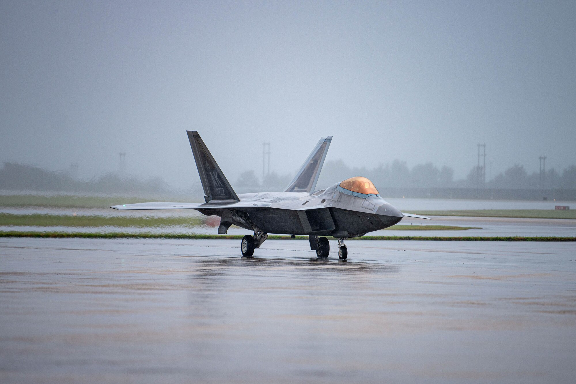 An aircraft taxis on a runway.