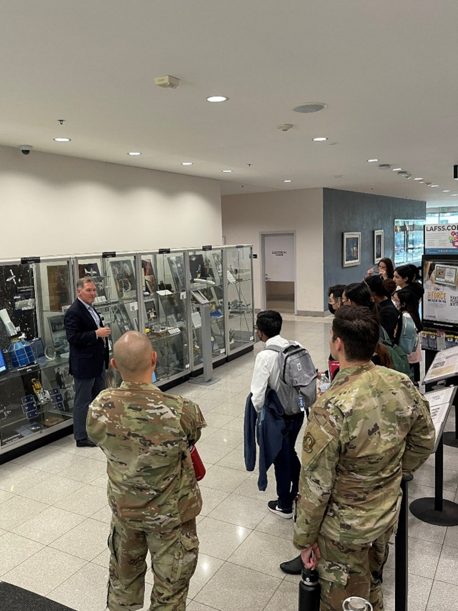 Lane Gilchrist, founder and president of the STEM Coalition, explains some of the exhibits at SSC’s Heritage Center to a group of students. Virtual and in-person tours of the center are offered as part of SSC’s Space STEM Outreach Program, to encourage young students to become involved with science, technology, engineering and mathematics classes. Photo by Van de Ha, SSC.