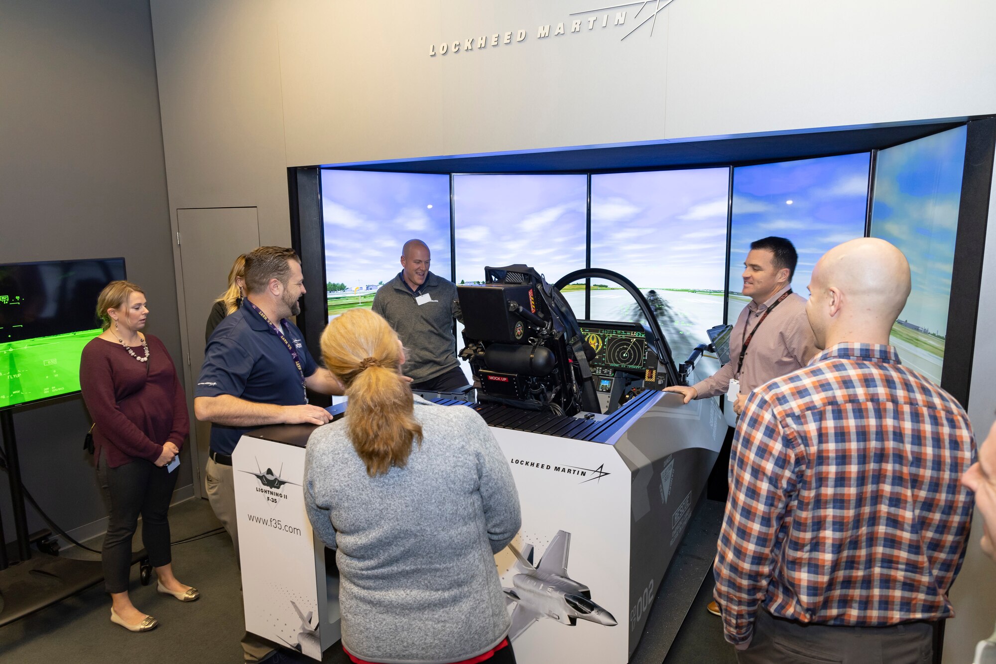 Members learn about the capabilities of an F-35 Aircraft during a visit at Lockheed Martin