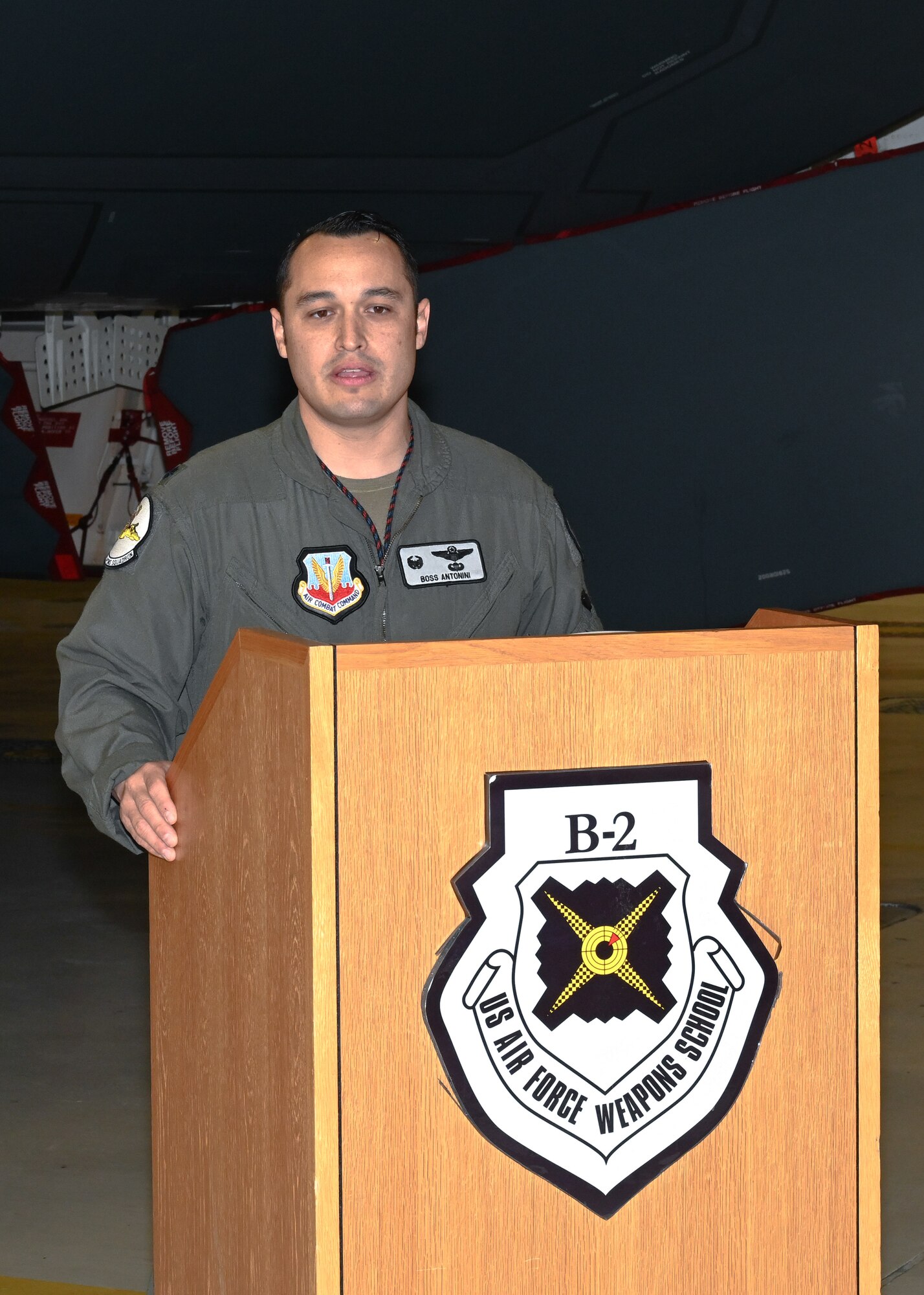 U.S. Air Force Lt. Col. Marcus Antonini, 325th Weapons Squadron commander, speaks at an award ceremony at Whiteman Air Force Base, Mo., Dec. 13, 2022. Antonini spoke about the legacy of Lt. Col. Mark McGeehan for whom the award is named. (U.S. Air Force photo by Airman 1st Class Nash Truitt)