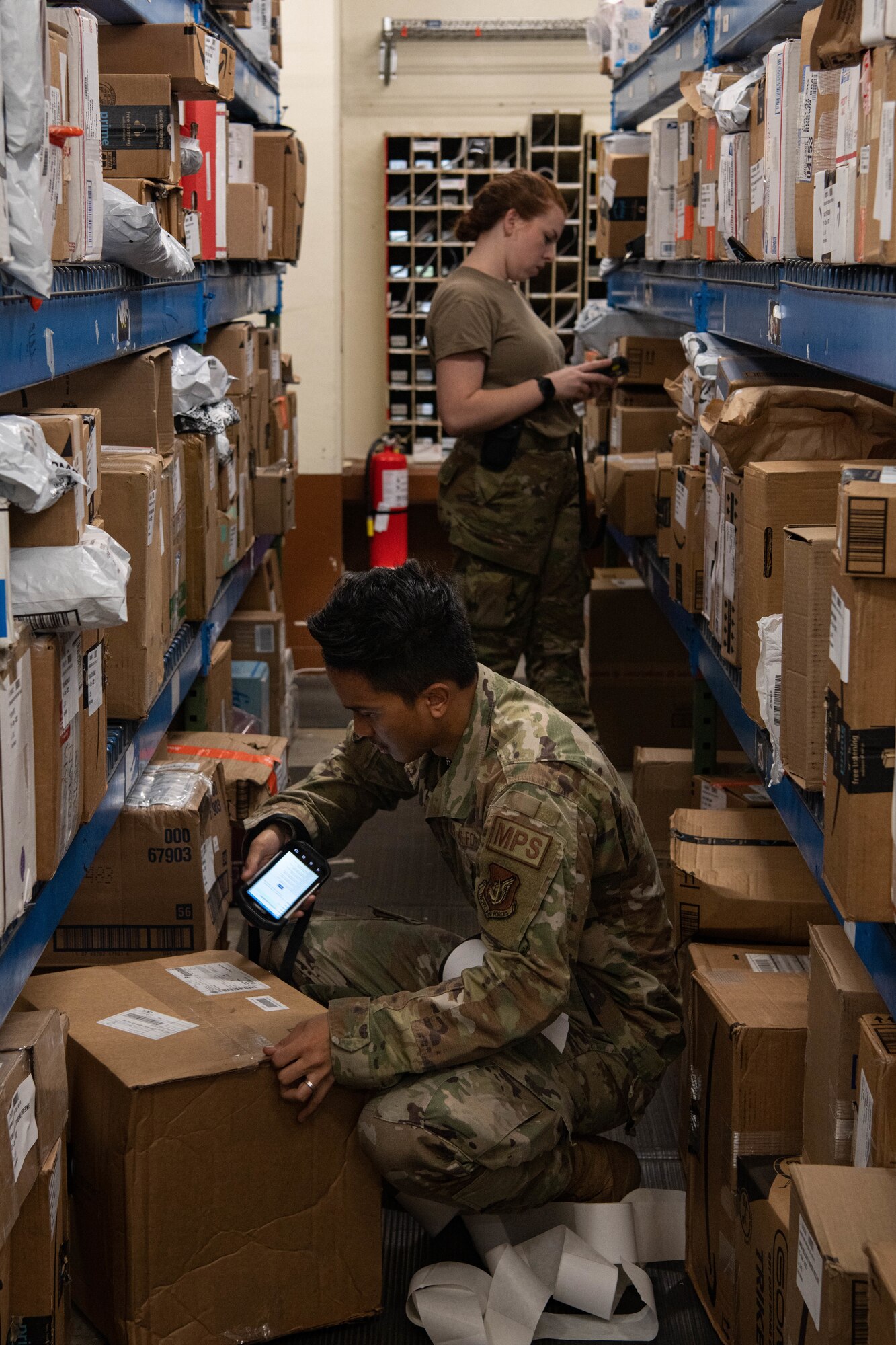 Airmen process mail.