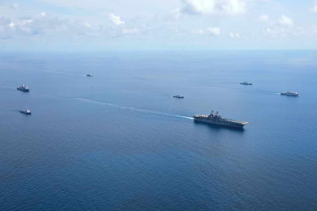 PACIFIC OCEAN (Dec. 18, 2022) – U.S. Marines with the 13th Marine Expeditionary Unit and U.S. Navy Sailors assigned to amphibious assault ship USS Makin Island and amphibious transport dock USS Anchorage sail alongside vessels of the Indonesian Navy during Cooperation Afloat Readiness and Training/ Marine Exercise (MAREX) Indonesia 2022, Dec. 18. CARAT/MAREX Indonesia is a bilateral exercise between Indonesia and the United States designed to promote regional security cooperation, maintain and strengthen maritime partnerships, and enhance maritime interoperability. In its 28th year, the CARAT series is comprised of multinational exercises, designed to enhance U.S. and partner navies’ and marine corps abilities to operate together in response to traditional and non-traditional maritime security challenges in the Indo-Pacific region. (U.S. Marine Corps photo by Gunnery Sgt. Chad J. Pulliam)
