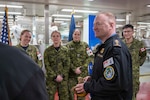 221221-N-KK394-1021
NORFOLK, Va. (Dec. 21 2022) Royal Canadian Navy Rear Adm. David Patchell, vice commander, U.S. 2nd Fleet, speaks with Canadian Armed Forces personnel aboard the Military Sealift Command hospital ship USNS Comfort (T-AH 20) following its return to homeport at Naval Station Norfolk, Dec. 21. U.S. 2nd Fleet, reestablished in 2018 in response to the changing global security environment, develops and employs maritime forces ready to fight across multiple domains in the Atlantic and Arctic in order to ensure access, deter aggression and defend U.S., allied, and partner interests.  (U.S. Navy photo by Mass Communication Specialist 2nd Class Anderson W. Branch)