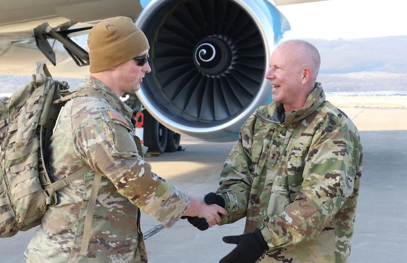 U.S. Army Maj. Gen. Mark Schindler, right, the Adjutant General of Pennsylvania, welcomes home Soldiers with 1st Battalion, 109th Infantry Regiment, 2nd Infantry Brigade Combat Team, 28th Infantry Division as they arrive home to Pennsylvania in time for the holidays after serving a nine-month deployment to the Sinai Peninsula, Egypt in support of Multinational Force and Observers. The Soldiers arrived at Wilkes-Barre Scranton International Airport before reuniting with their loved ones at the Armed Forces Reserve Center in Scranton.