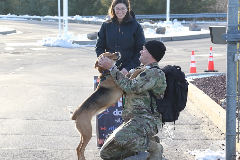 U.S. Army Capt. Cody Lauer, with 1st Battalion, 109th Infantry Regiment, 2nd Infantry Brigade Combat Team, 28th Infantry Division, reunites with his dog after arriving home to Pennsylvania in time for the holidays after serving a nine-month deployment to the Sinai Peninsula, Egypt in support of Multinational Force and Observers. Soldiers arrived at Wilkes-Barre Scranton International Airport before reuniting with their loved ones at the Armed Forces Reserve Center in Scranton.