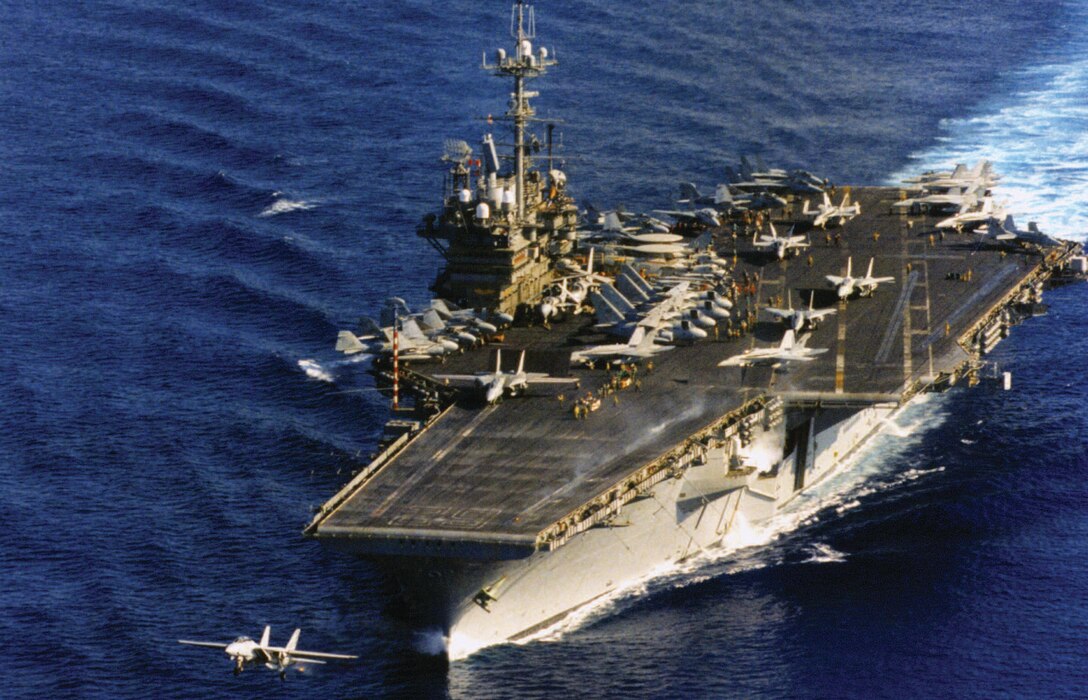 Grumman F-14A Tomcat launches from Navy aircraft carrier during operations east of Taiwan