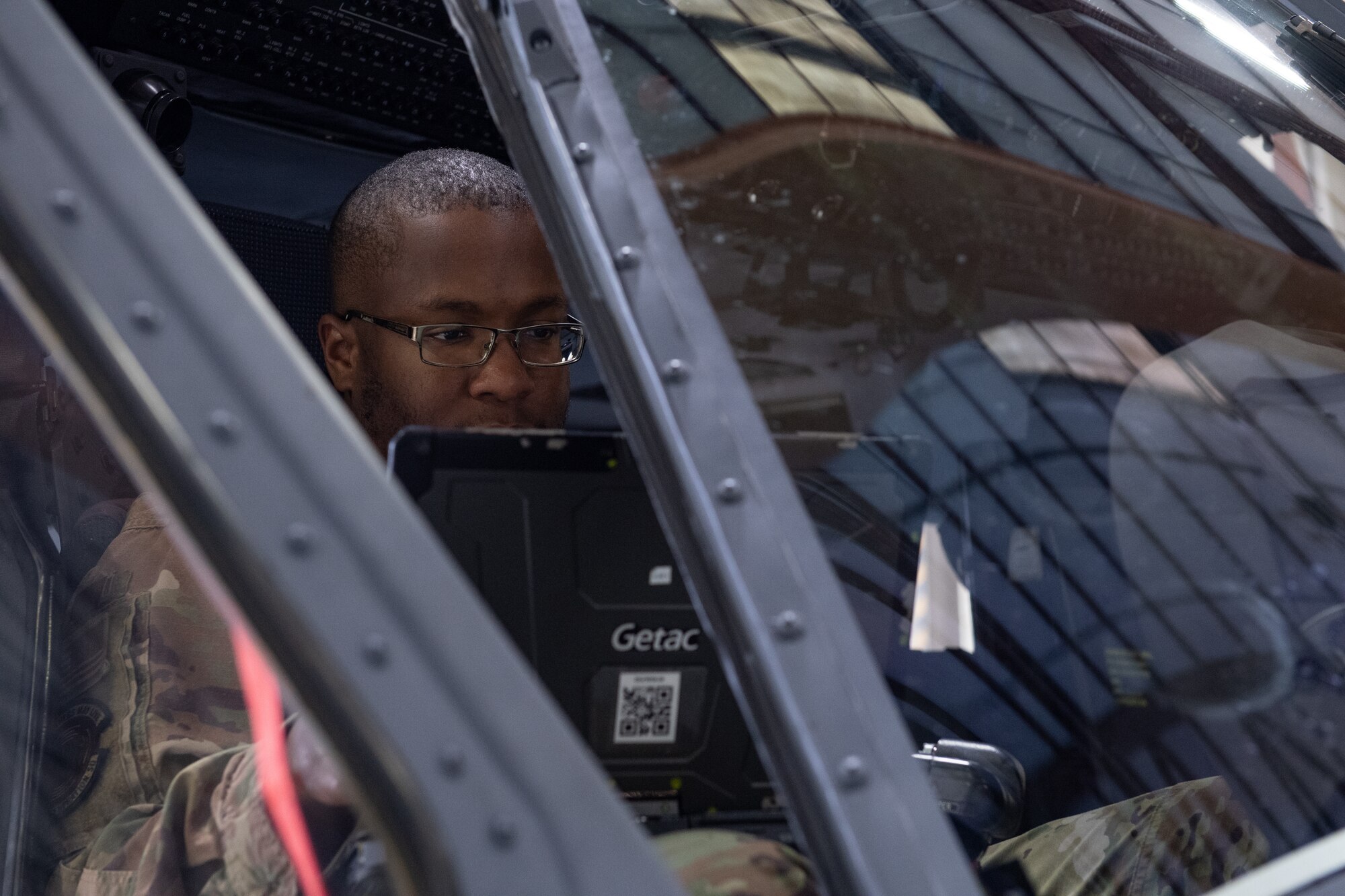 U.S. Air Force Senior Airman Christopher Williams, 41st Rescue Generation Squadron communications and navigation Airman, conducts regular maintenance Dec. 22, 2022, at Moody Air Force Base, Georgia. When there’s a deficiency, Airmen are able to submit reports to a product improvement manager to ensure the discrepancy is resolved in order to continue conducting operations. (U.S. Air Force photo by Staff Sgt. John Crampton)