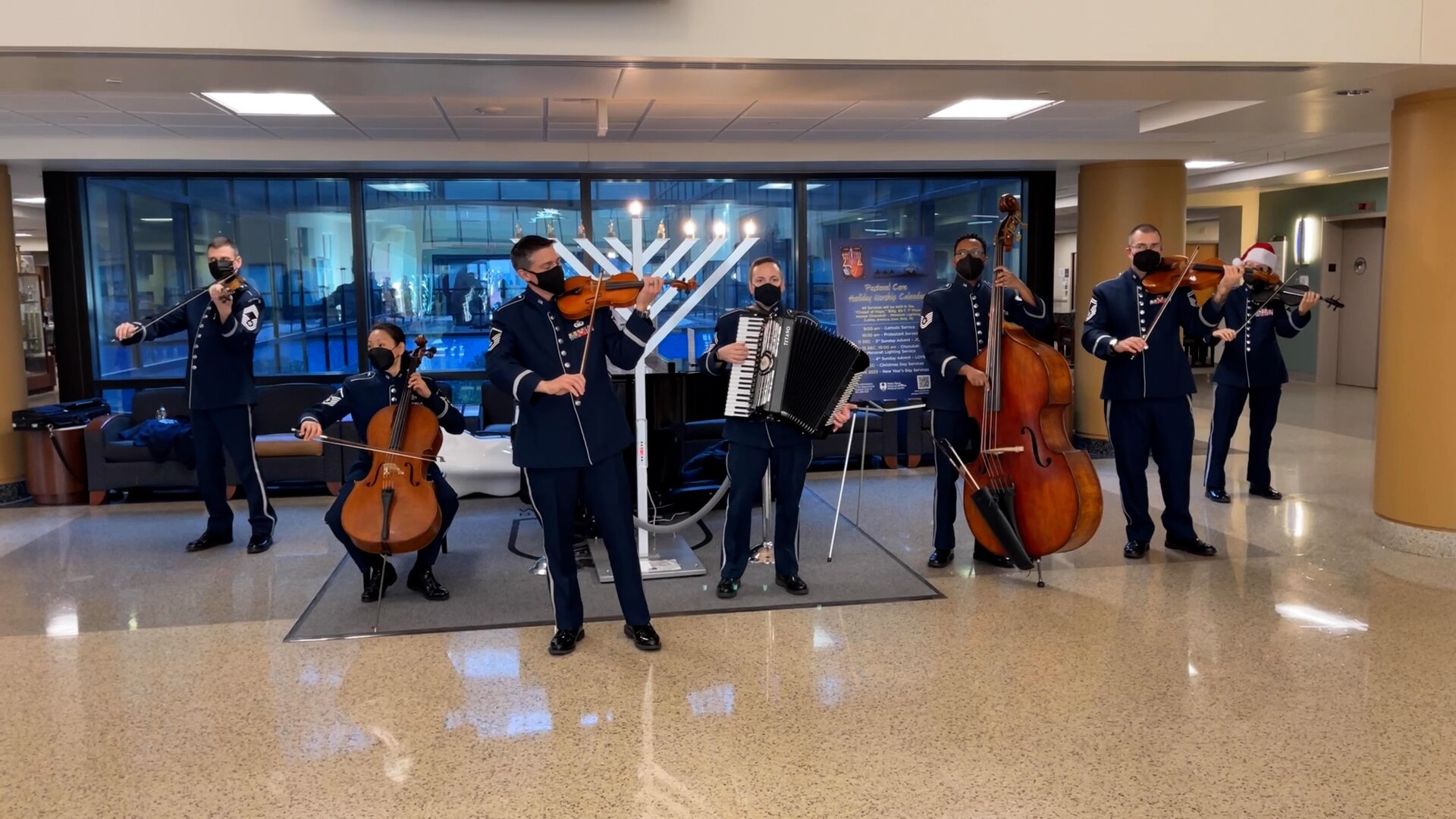The U.S. Air Force Strings ensemble performed their final concert of the year in the lobby of the America building located in building 19 at Walter Reed National Military Medical Center